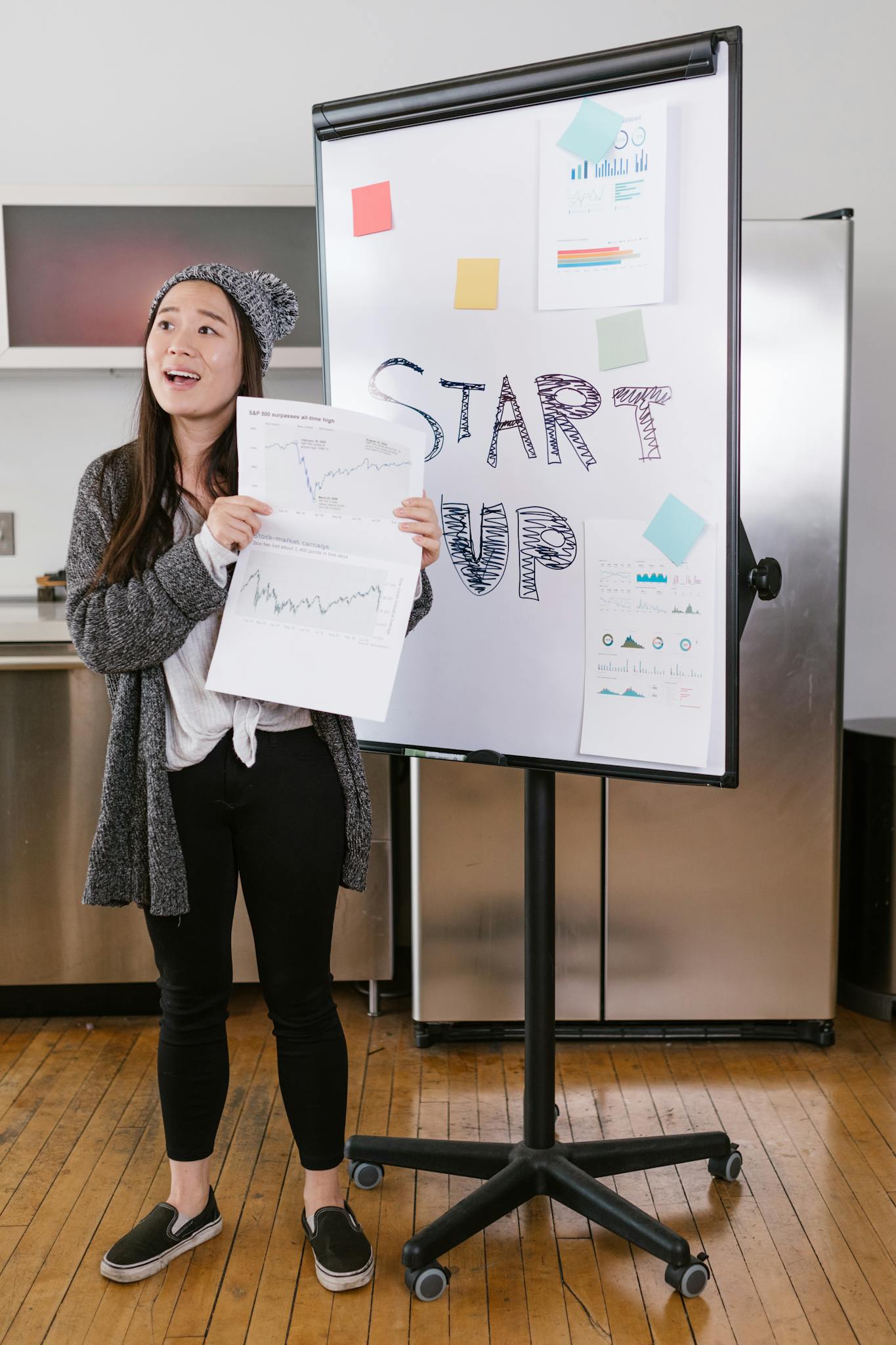 A Young Woman Gives A Startup Presentation